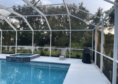 revitalized pool enclosure, where it was re-screened, rusty screws & old hardware replaced. door kits installed and the aluminum enclosure was thoroughly cleaned.